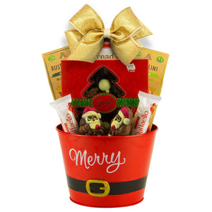 merry holiday red bucket filled with the best goodies for holiday