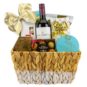 Elegant luxury gift basket for all seasons and occasions, contains the best quality chocolates, snacks, cookies and red wine.