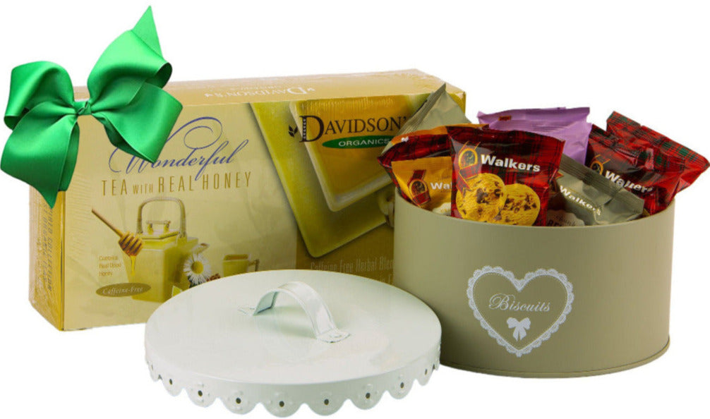 organic Davidson tea box and Round "Biscuits" tin with scalloped edge cover full of walkers individually packed cookies